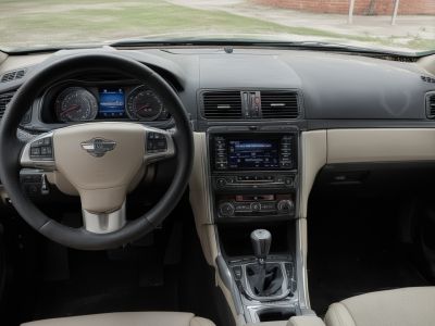 Before: Modern car interior with embedded dirt and wear